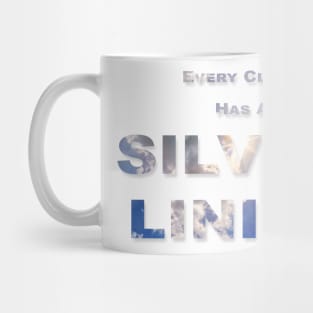 Every Cloud Has A Silver Lining text with clouds and sun burst showing through the text. Mug